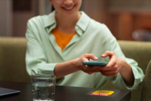 front view woman reading menu restaurant